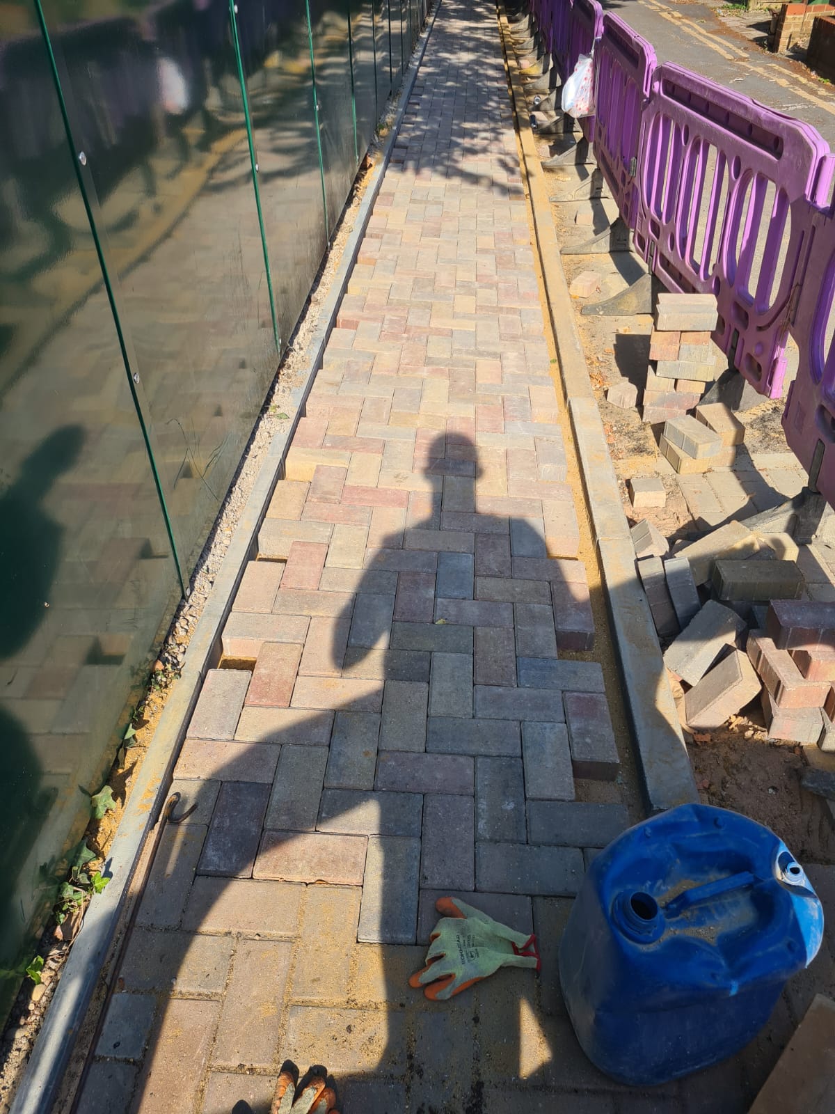 Part-completed block-paved route