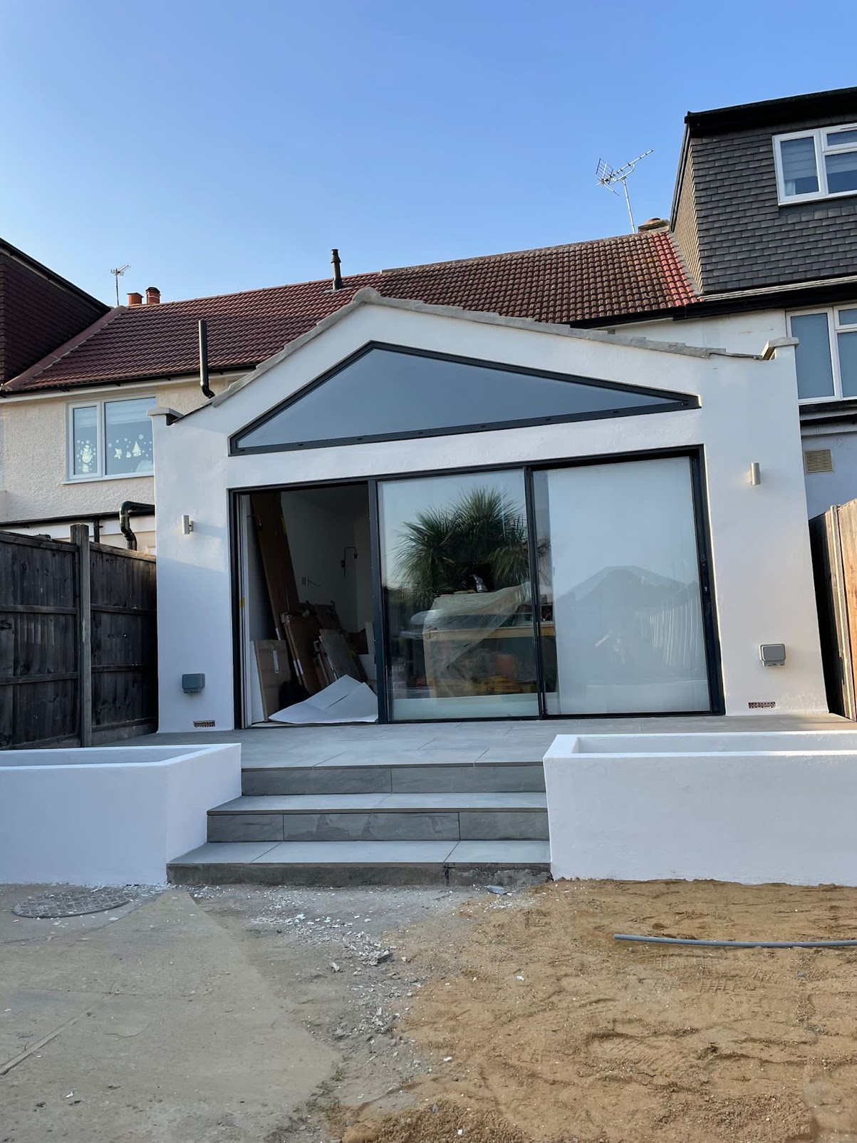 Rear extension with new paved steps