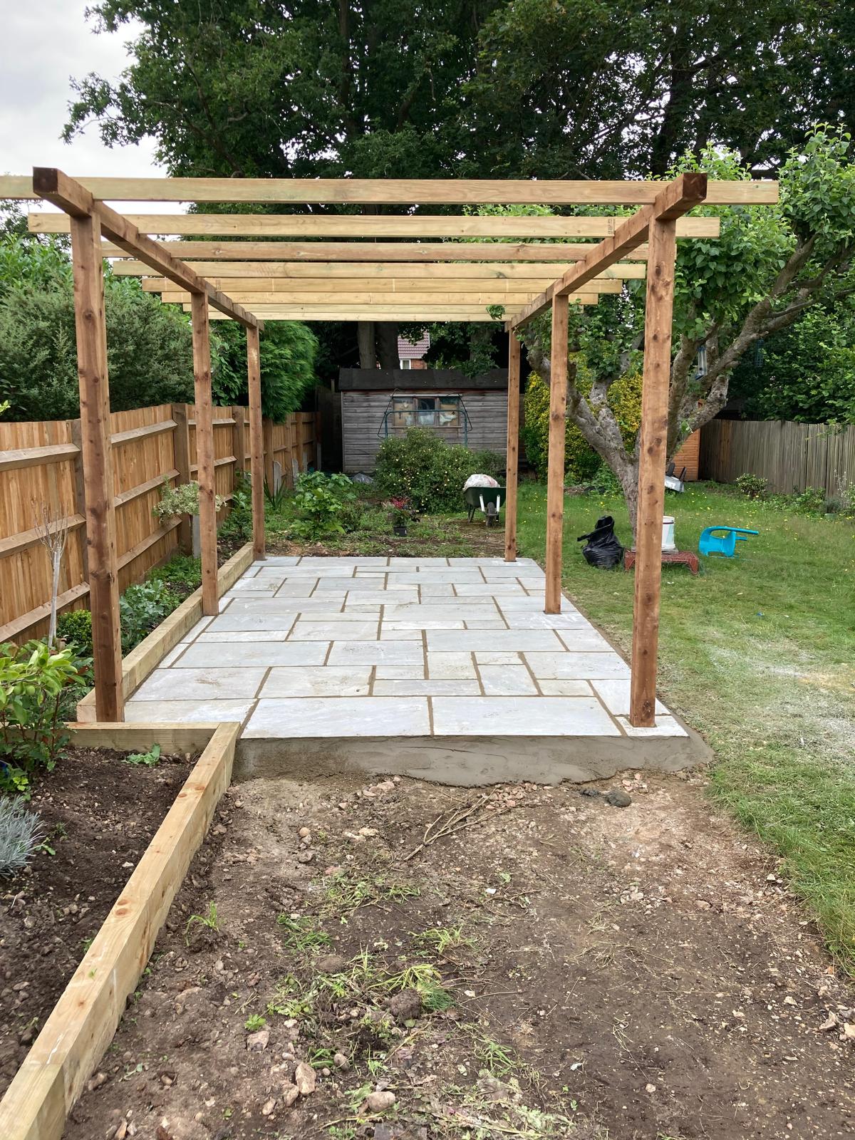 Pergola and paved seating area